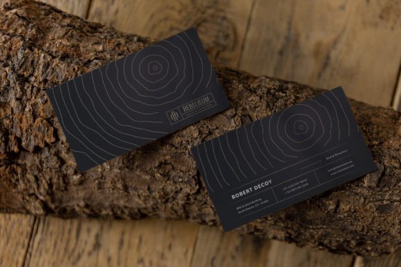 Elevating Brand Identity with a Business Card Mockup on a Wooden Background
